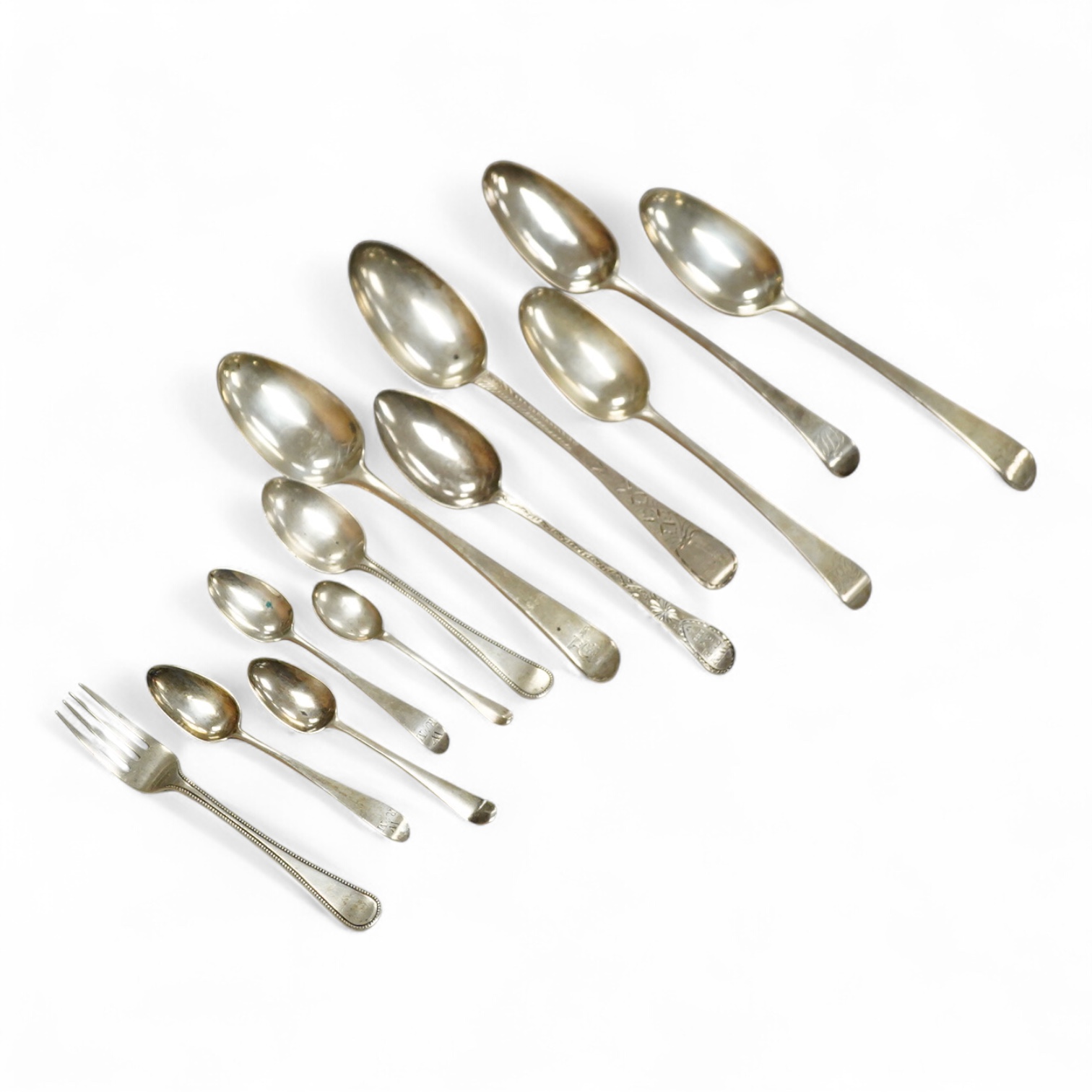 A pair of George III Old English pattern table spoons by Sumner & Crossley, London, 1778, 21.6cm, together with ten other items of Georgian and later silver flatware, including table spoons, teaspoons and a fork, various